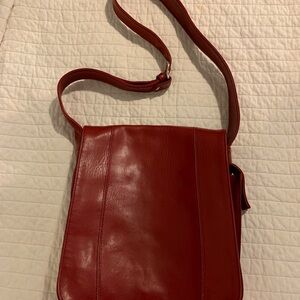 Coach Red Leather Flap, back pocket and also a side pocket.